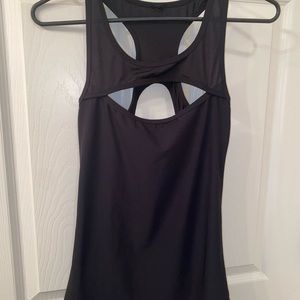 The tags are cut off of this top, looks like a S